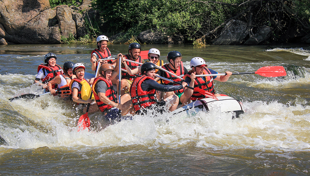 People Enjoying Rafting